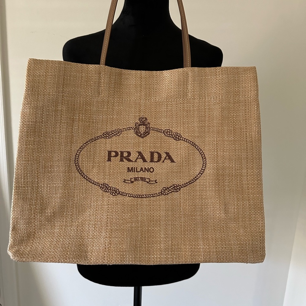 Authentic Prada rafia bag, NWOT,  dress it up or take to the beach. 3 in stock